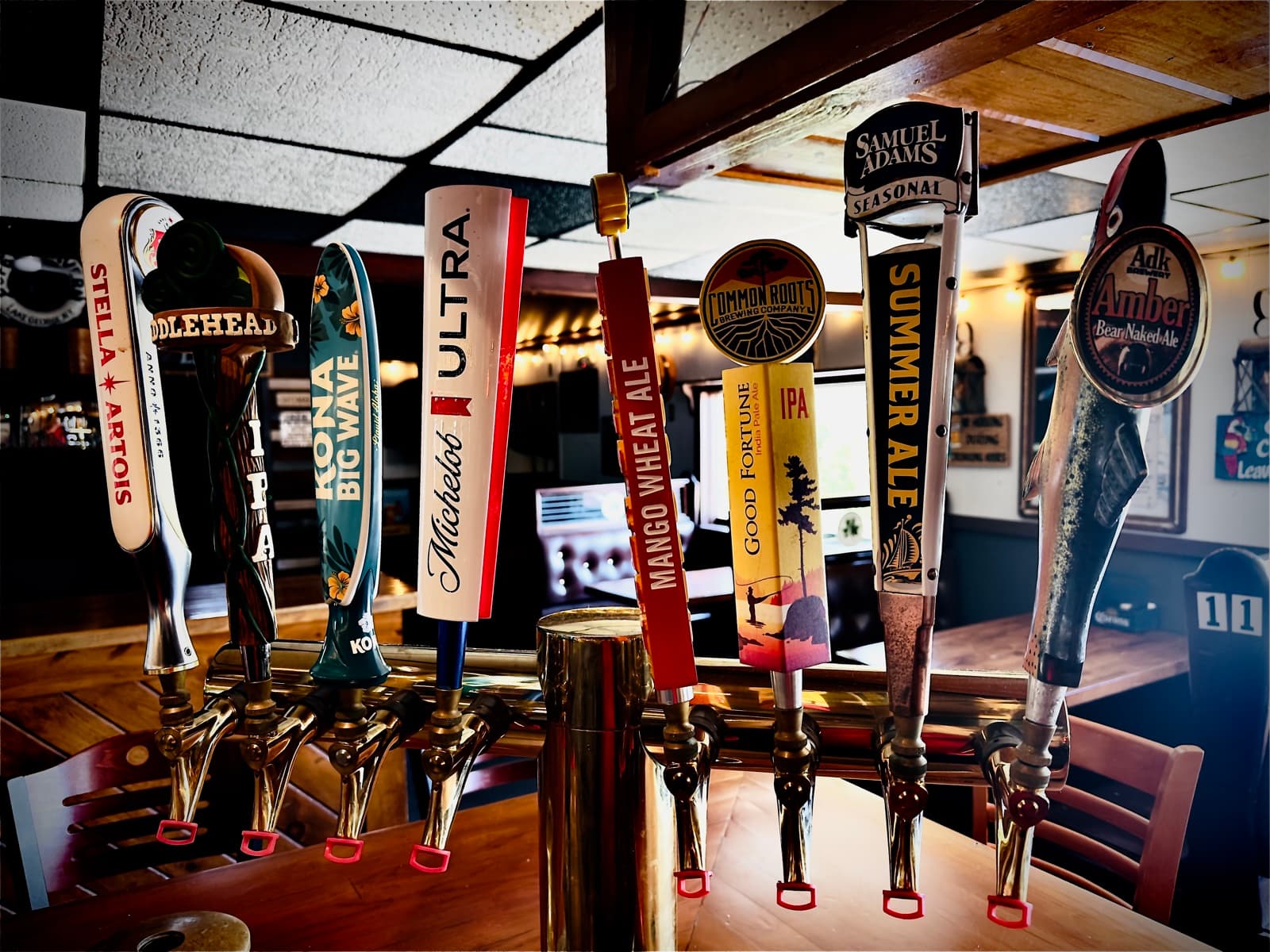 A lineup of Duffy's draft taps, from Stella Artois and Fiddlehead to Sam Adams Summer Ale and Bear Naked Ale
