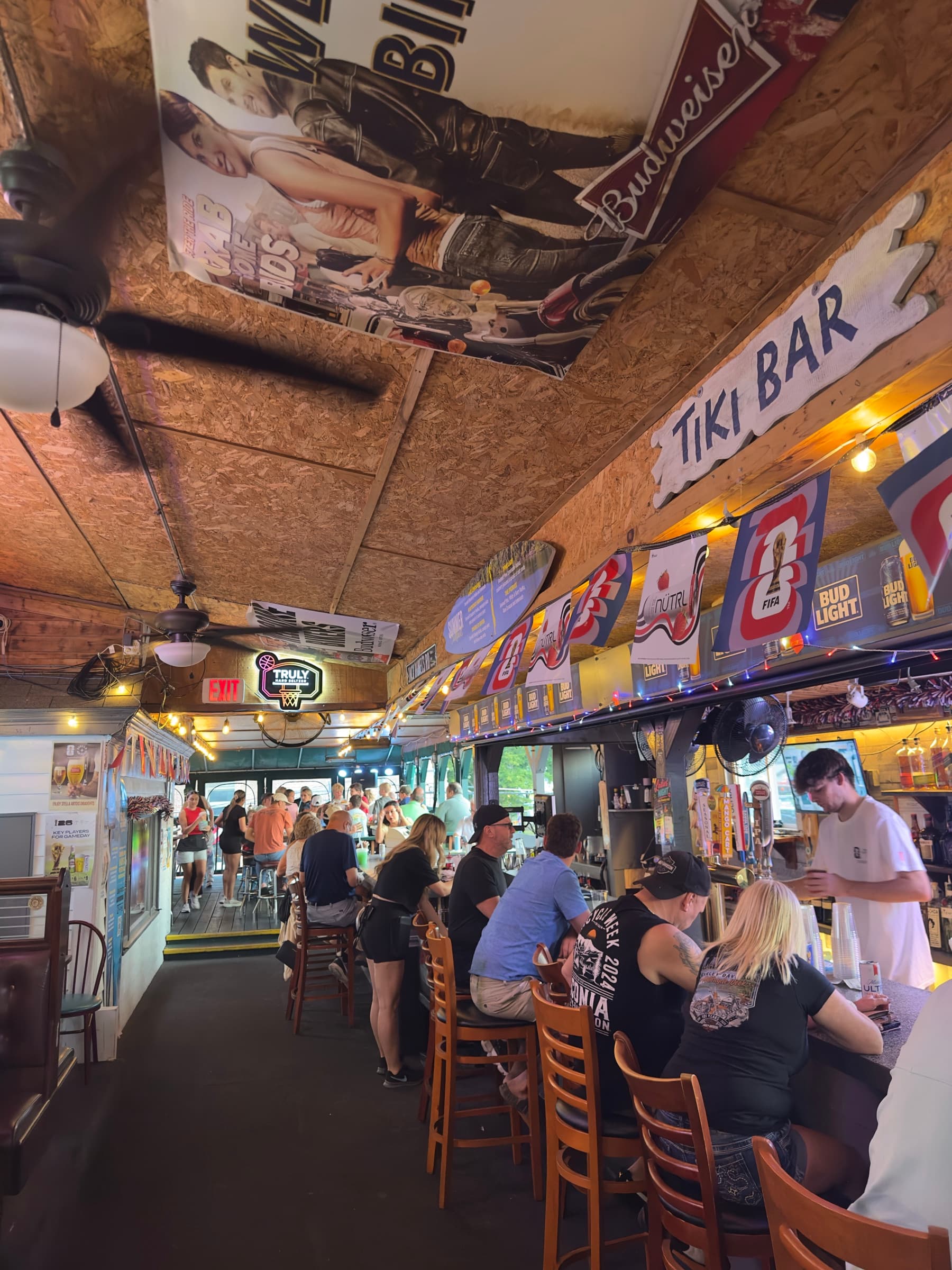 Duffy's open-air Tiki Bar, strung with lights and packed with regulars
